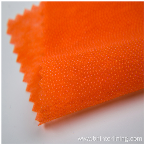 Shrink-resistant  nonwoven coat fusing interlining